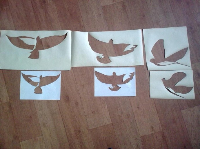 Идея дизайнерского украшения стены птичками