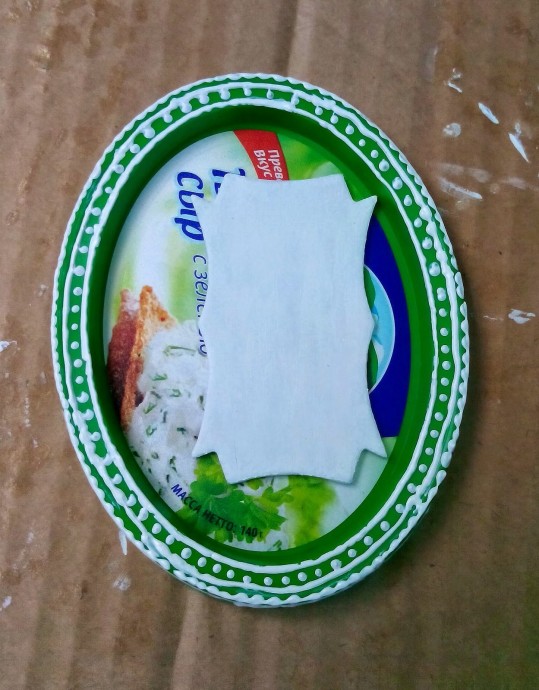 Фоторамка из пластиковой крышки