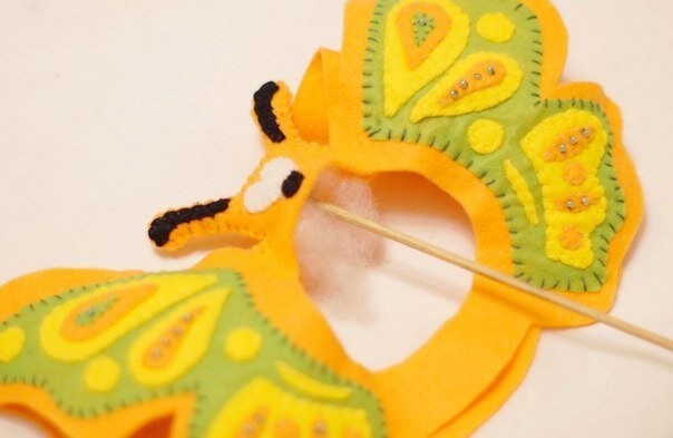 Игрушка на фотоаппарат