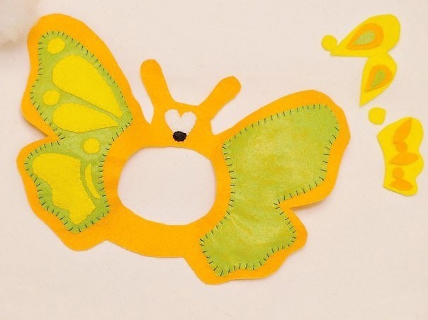 Игрушка на фотоаппарат