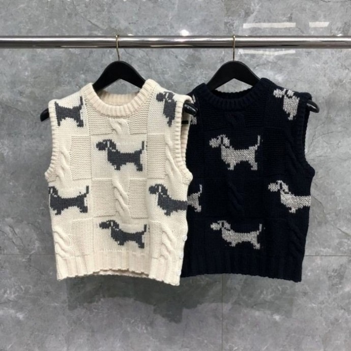 Безрукавка спицами с собачками Безрукавка спицами с собачками