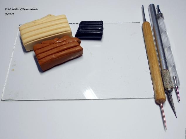 Мишка - малыш из полимерной глины