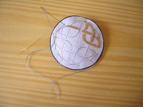 Двухсторонний кулон с кельтским орнаментом