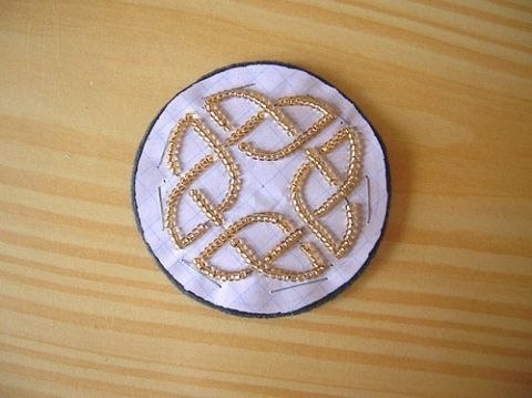 Двухсторонний кулон с кельтским орнаментом