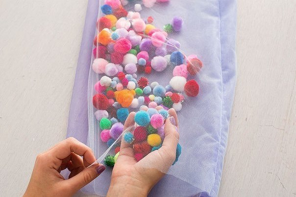 Юбочка с помпонами для девочки