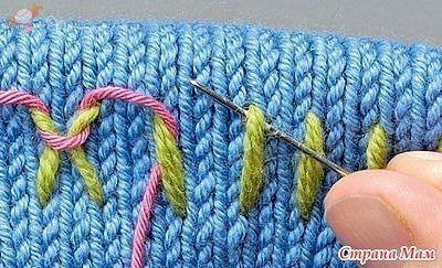 Вышивка по вязаному полотну.