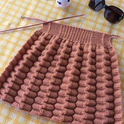 Вязаная юбочка с оригинальным плиссе