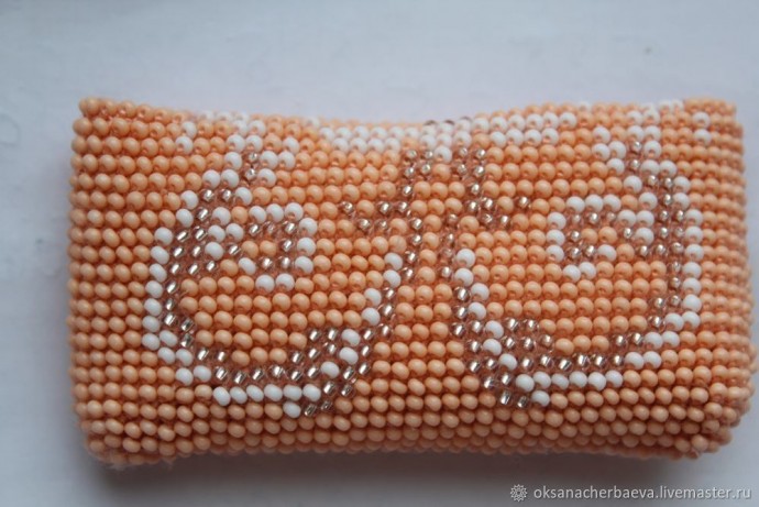 Вязание очечника "Яркий цветок"