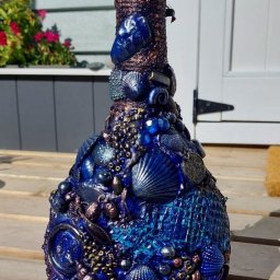 Декор бутылочек с ракушками в морском стиле