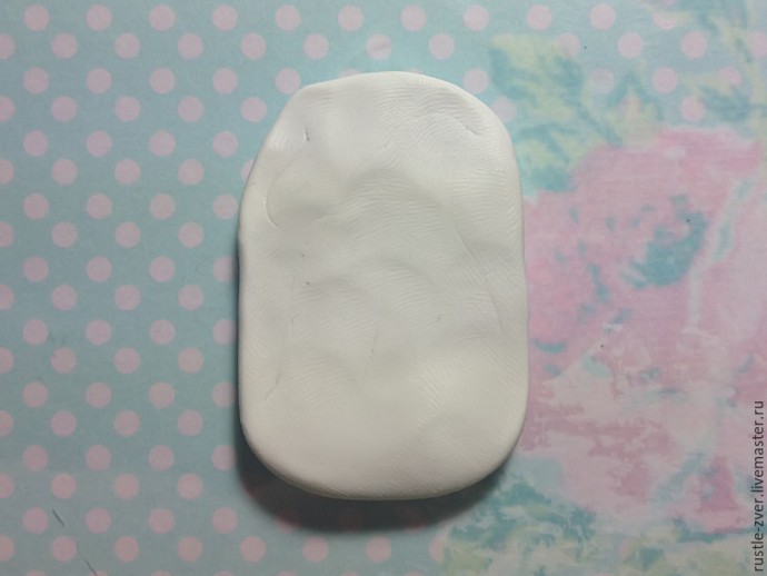 Ангел с розочками из полимерной глины