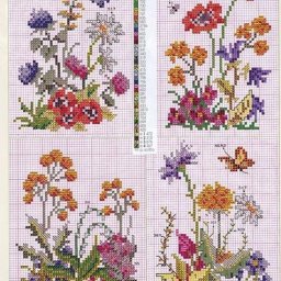 Множество вышитых цветов