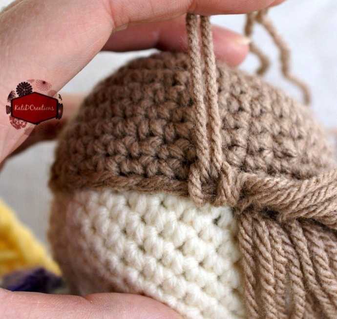 Прическа вязаной куколке: мастер-класс