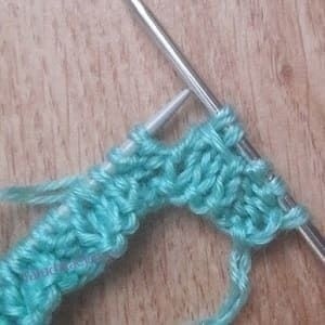 Узор "Замочек" спицами