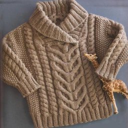 Узорчатый детский свитер спицами