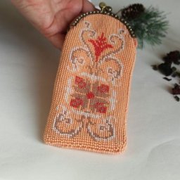 Вязание очечника "Яркий цветок"