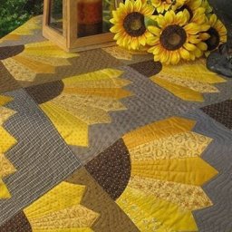 Желтые подсолнухи в лоскутном решении