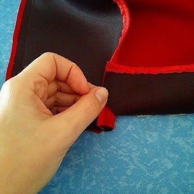 Способ обработки низа пальто в части соединения с подбортом