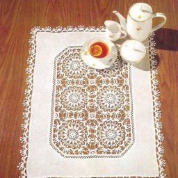 Великолепная салфетка с ажурными мотивами крючком