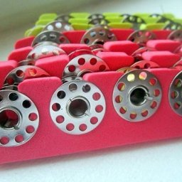 ​Варианты хранения шпулек для швейной машинки