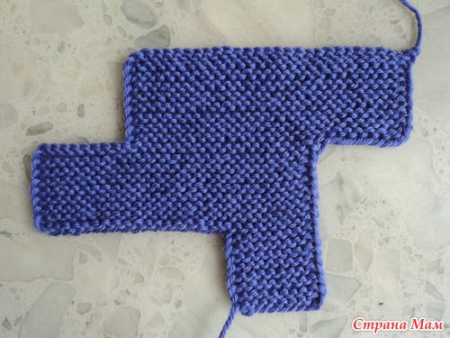 Вязаные тапочки спицами "Чиполино"