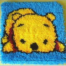 Вышивка в ковровой технике медвежонка