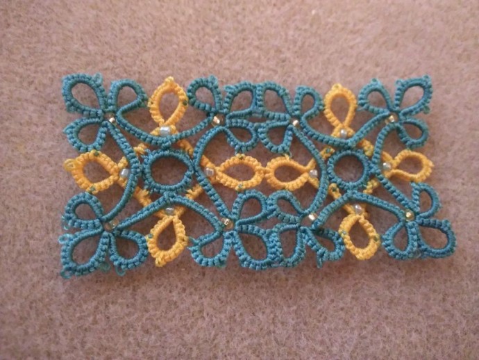 Зажим в технике фриволите