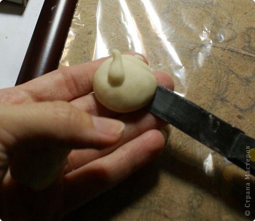 Панно "Повар с баранками и чаем" из соленого теста Панно "Повар с баранками и чаем" из соленого теста