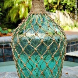 ​Декорирование бутылки веревкой в морском стиле