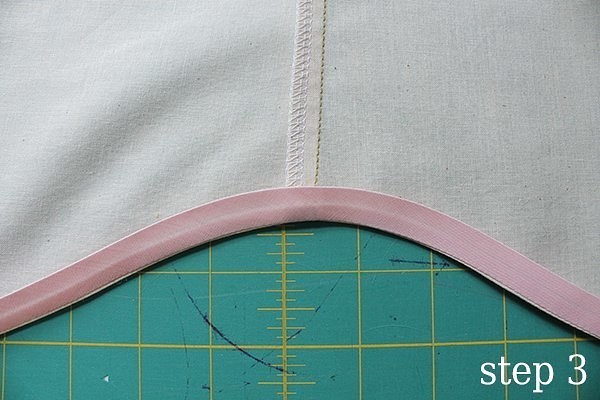 Обработка криволинейного низа изделия косой бейкой