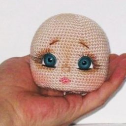 ​Лицо вязаной декоративной куколки