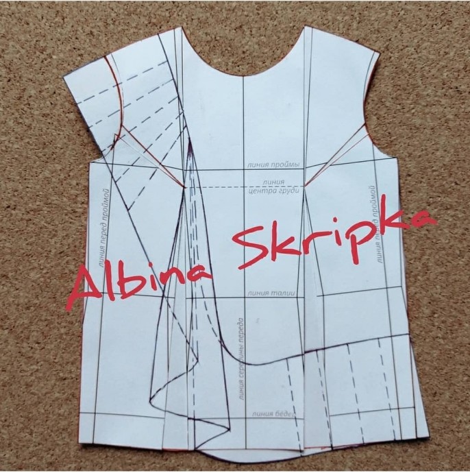 Ассимметричная блузка с воланом