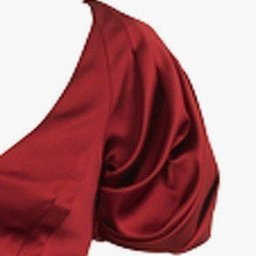 ​Блуза с округлыми мягкими складками на рукаве