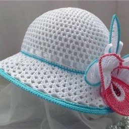 Нежная летняя шляпка с прекрасной орхидеей