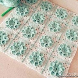 Плед мотивами крючком с объемными цветами
