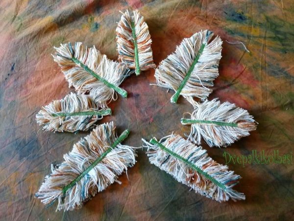 Как сделать перышки из ниток: мастер-класс Как сделать перышки из ниток: мастер-класс
