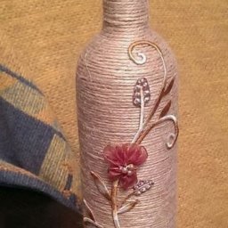 ​Бутылка с обмоткой бечевкой