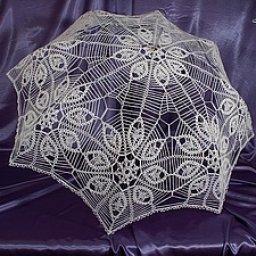 Превосходный ажурный зонтик от солнца