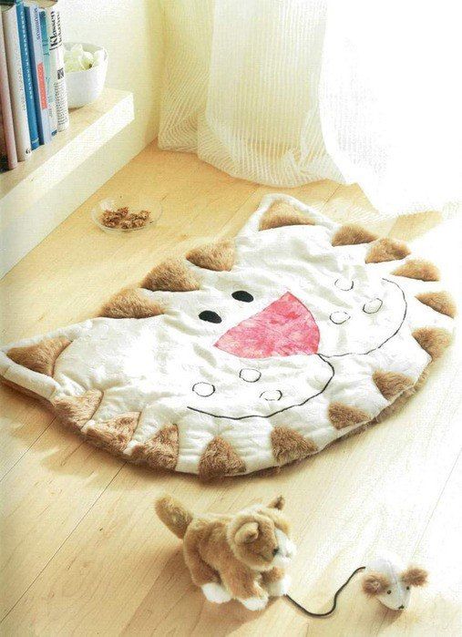 Коврик в виде мордочки кота