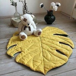 ​Коврик в форме резного листа