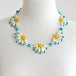 ​Колье из половинок цветов
