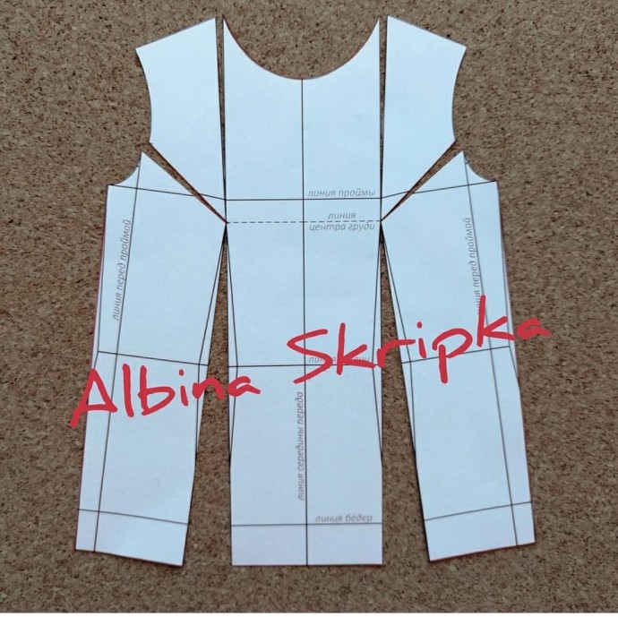 Ассимметричная блузка с воланом