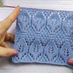 Ажурный узор с листьями спицами