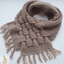 ​Стильный снуд спицами с переплетениями
