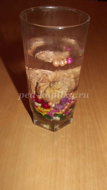 Декоративная свеча с ракушками