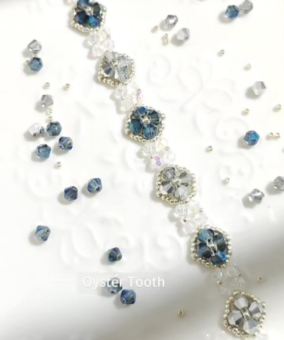 ​Серо-синий браслет из бисера и биконуса