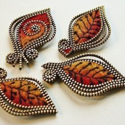 Оригинальные брошки с использованием молний