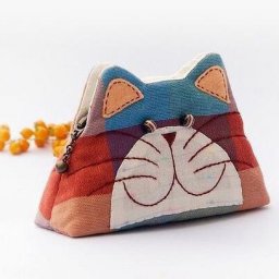 Косметичка в виде головы кошечки