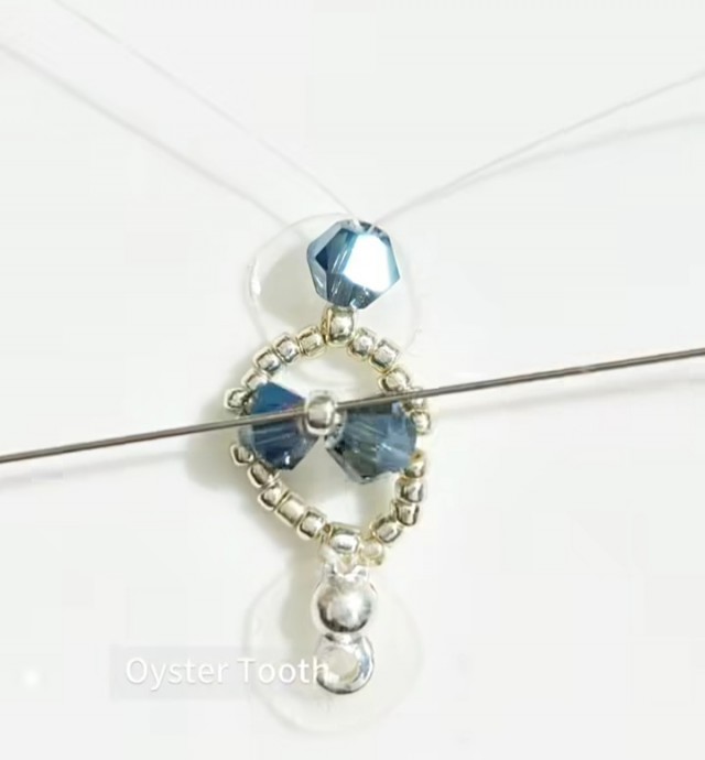 ​Серо-синий браслет из бисера и биконуса