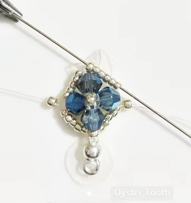 ​Серо-синий браслет из бисера и биконуса