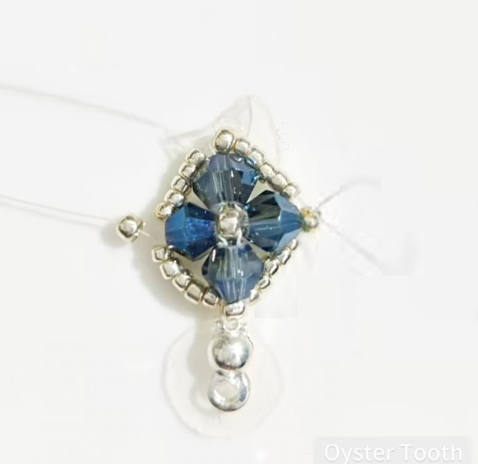 ​Серо-синий браслет из бисера и биконуса